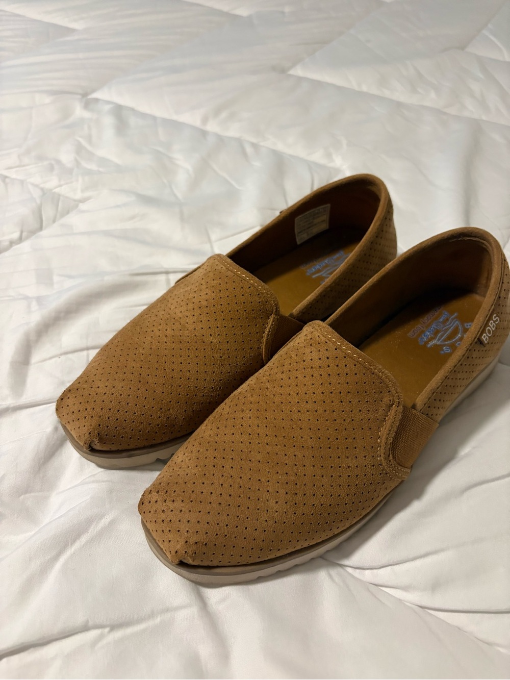 Skechers Women’s Perforated Slip-On Loafers in Tan